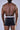 Drei TTCHAM Herren-Boxershorts mit buntem Afro-Print aus Baumwolle, bequemes Unterwäsche-Design, modernes Muster.